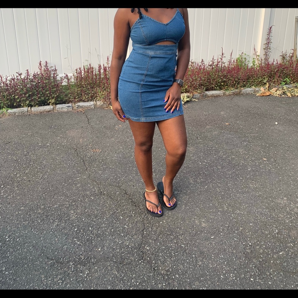 Denim dress, with a sexy peek-a-boo at the upper abdomen area